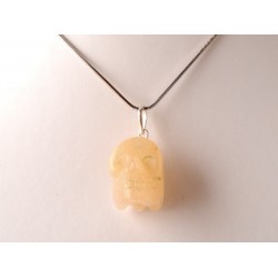 	Nyugalmat hozó, békét teremtő aranykvarc medál koponya formára csiszolva	