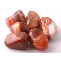 	Kiegyensúlyozó hatású, stresszoldó achát marokkő narancsos árnyalattal, sávos mintával	
