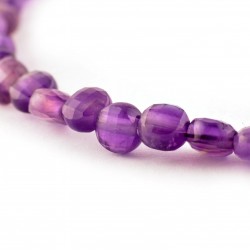 Fazettált ametiszt karkötő Fazettált ametiszt karkötő